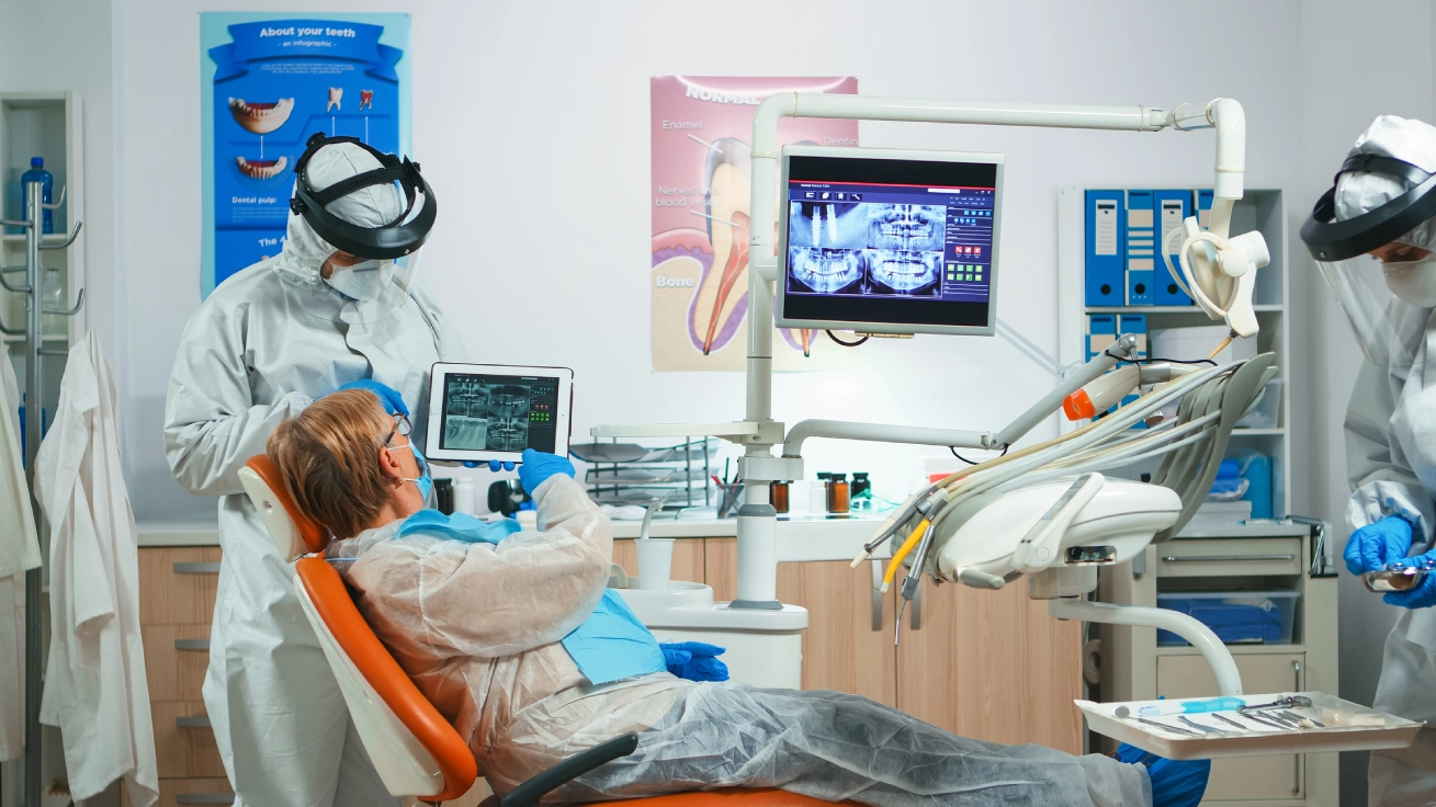 Dentist and patient in modern dental clinic.